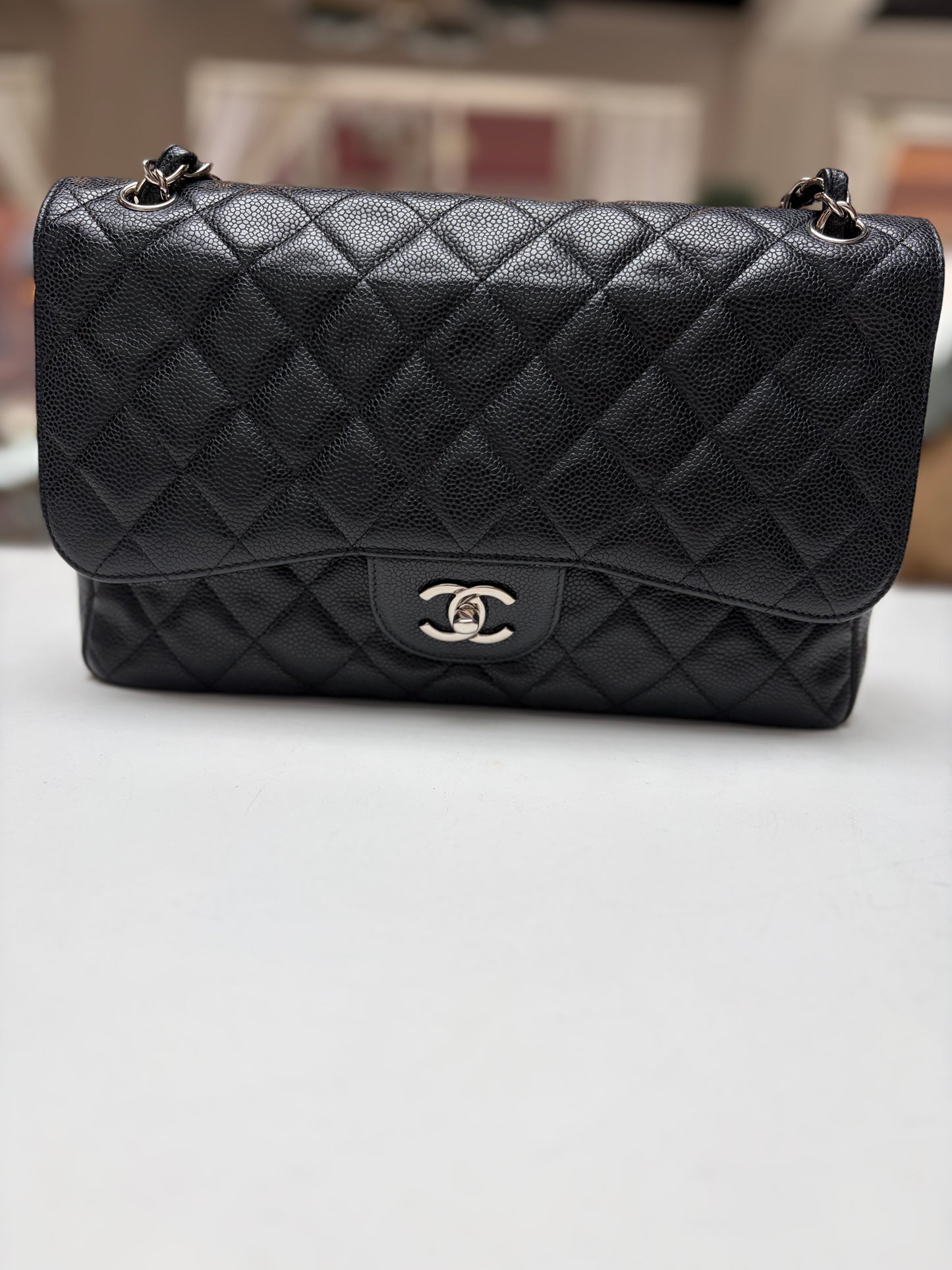 SOLD Chanel Classic Jumbo Double Flap Black Quilted Caviar Leather Shiny Silver Hardware