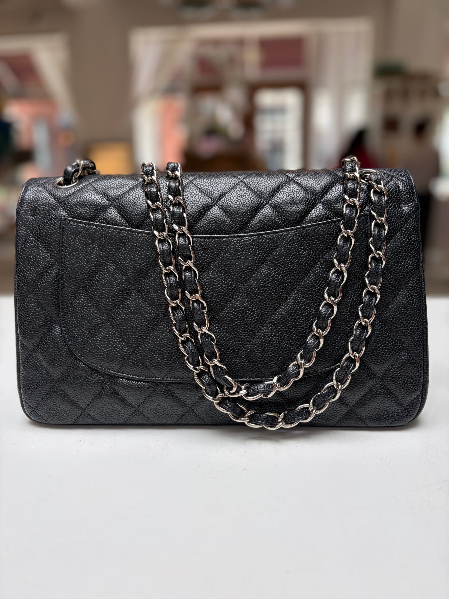 SOLD Chanel Classic Jumbo Double Flap Black Quilted Caviar Leather Shiny Silver Hardware