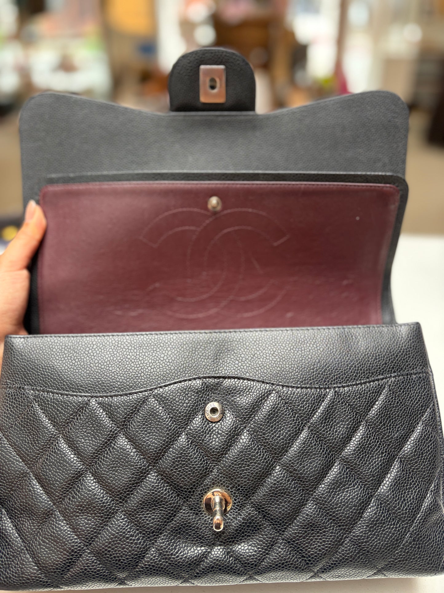 SOLD Chanel Classic Jumbo Double Flap Black Quilted Caviar Leather Shiny Silver Hardware