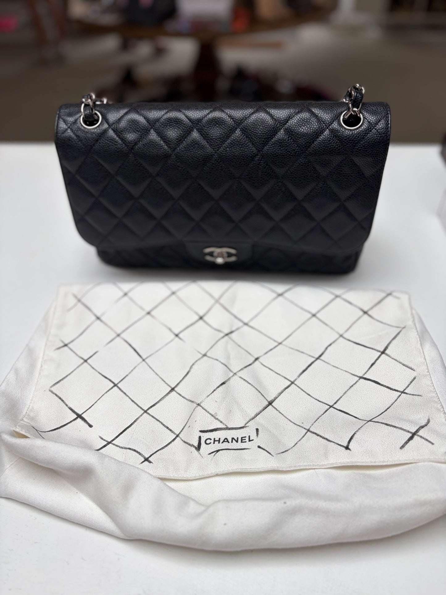 SOLD Chanel Classic Jumbo Double Flap Black Quilted Caviar Leather Shiny Silver Hardware