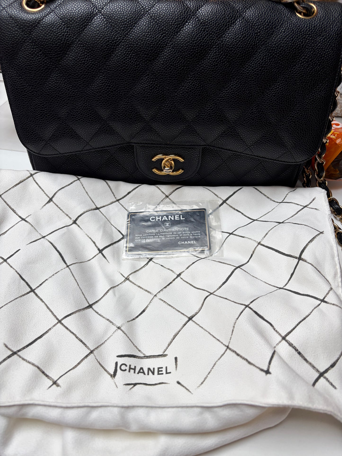 Chanel Classic Jumbo Double Flap Black Quilted Caviar Leather Gold Hardware