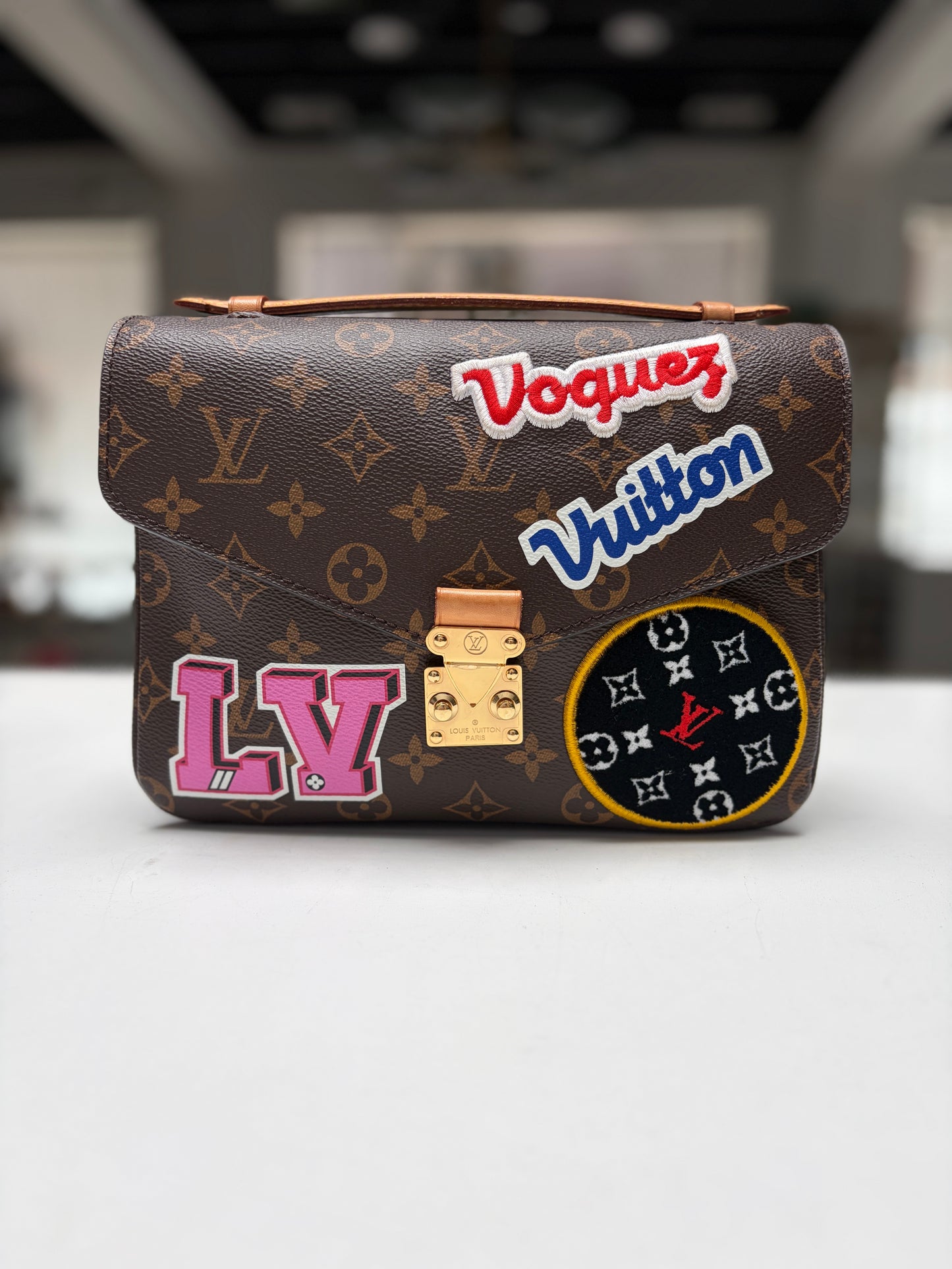 LV Monogram My World Tour Porchette Metris